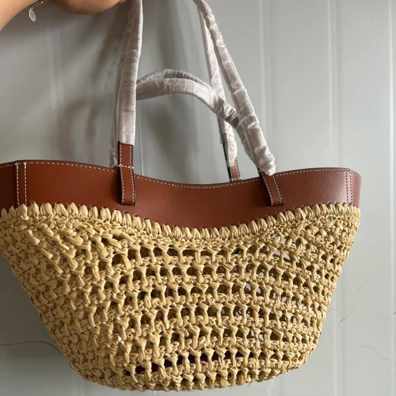 Woven Straw Bag - ブランド中空織ビーチバッグニッチファッションショルダー脇の下バッグ大容量ハイエンドステッチトートバッグ女性のバケットバッグ